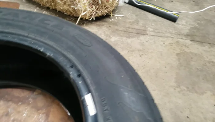 Drill four sets of holes on the tire, using a large drill bit.