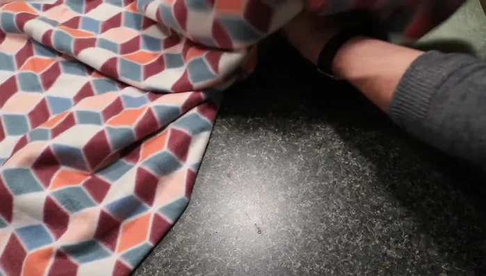 Cut strips: Cut lengthwise strips approximately 3-4 inches wide. The length depends on your desired toy length, but start longer than needed as braiding shortens it. Aim for a consistent width to ensure even strength.