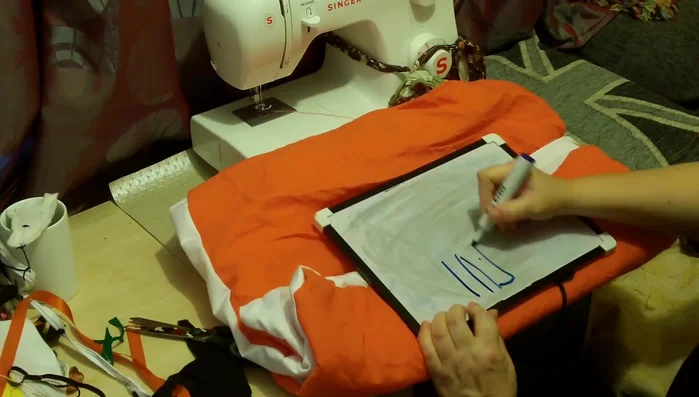 Optional: Create armholes. Cut angles at the sides of the rectangle and fold them over for a cleaner finish. If the costume is going under the arms, use ribbon to support it.