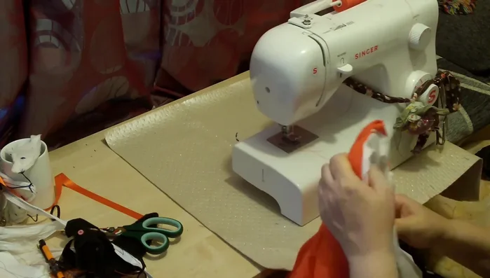 Add shoulder straps: Sew ribbons to the top edges for shoulder straps.