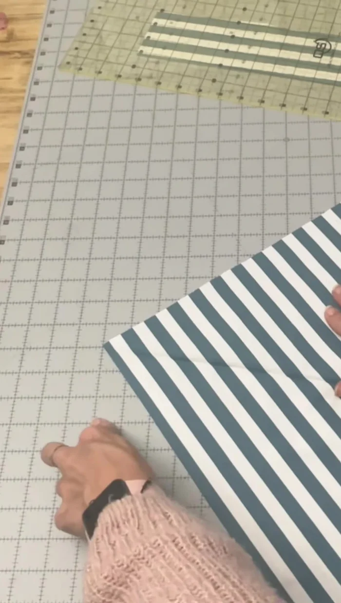 Fold in the two side corners (about 2 inches each), press.