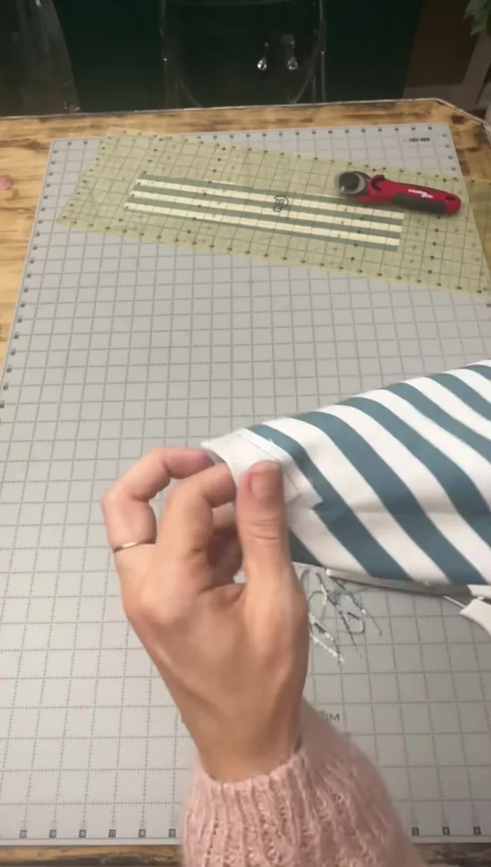 Fold in the side edges again. 