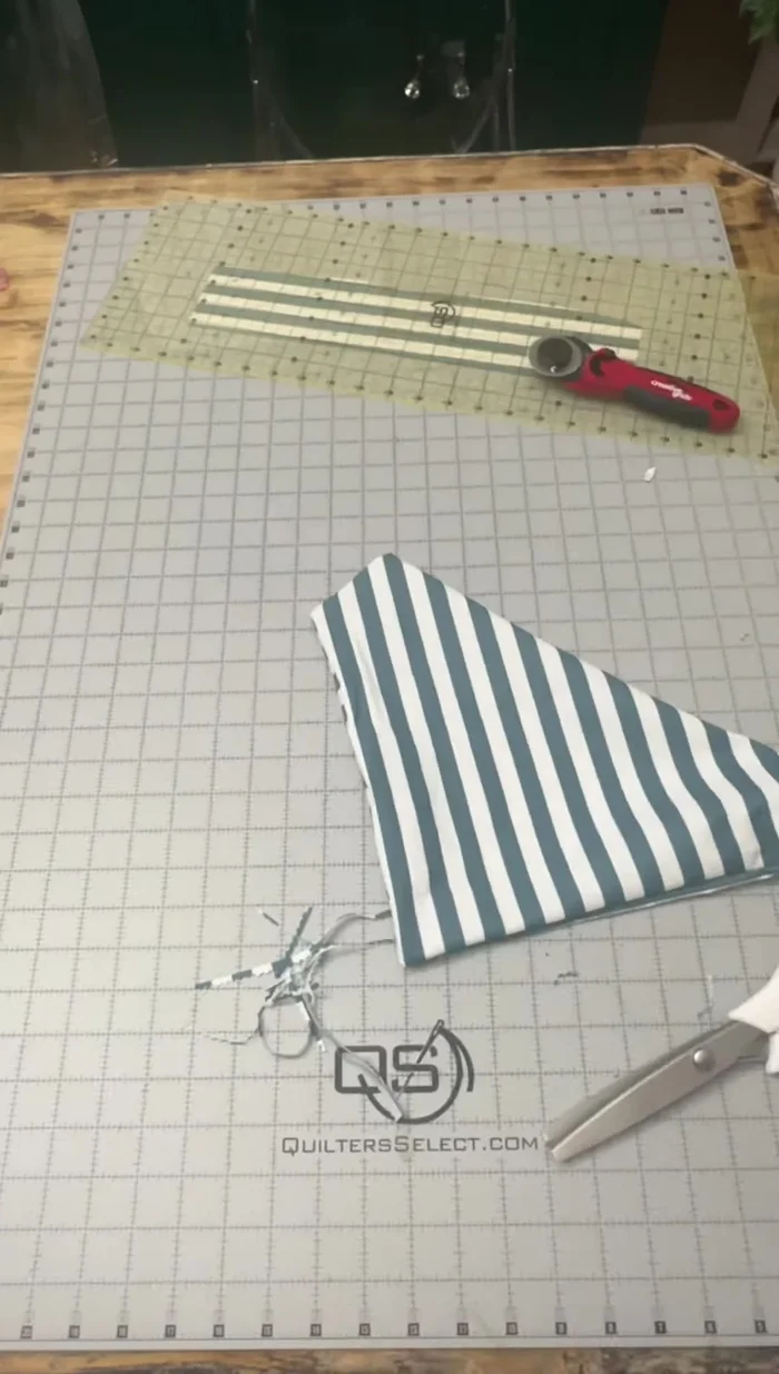 Sew a line across the top, securing the folded edges. (Optional: Draw a guideline with an air erasable marker).