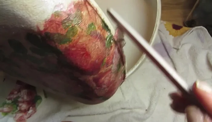 Apply a top coat of decoupage glue.