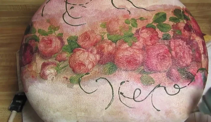 Apply a top coat of decoupage glue.