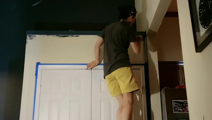 Paint the wall with deep smoky blue paint.