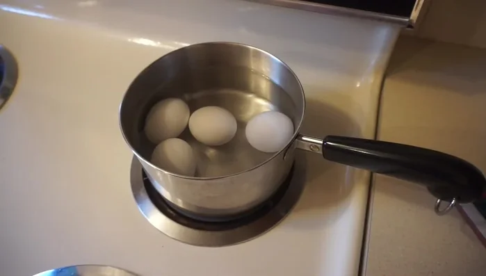 Remove bones from chicken: Remove bones from 20% of the baked chicken thighs (2 out of 10 in this example).