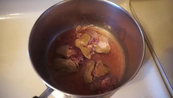 Remove bones from chicken: Remove bones from 20% of the baked chicken thighs (2 out of 10 in this example).