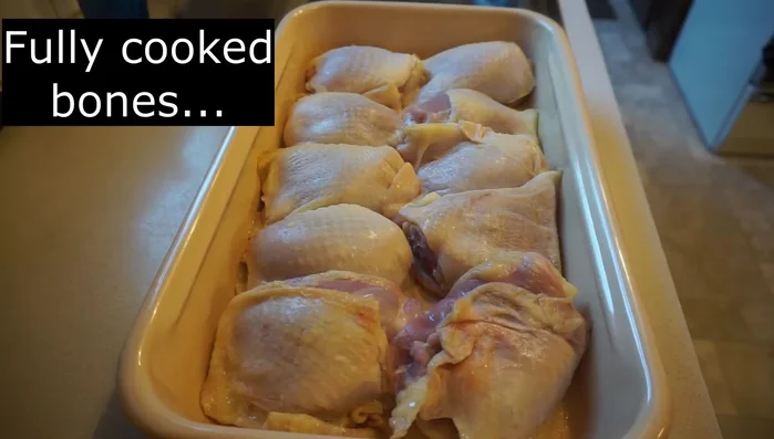 Remove bones from chicken: Remove bones from 20% of the baked chicken thighs (2 out of 10 in this example).