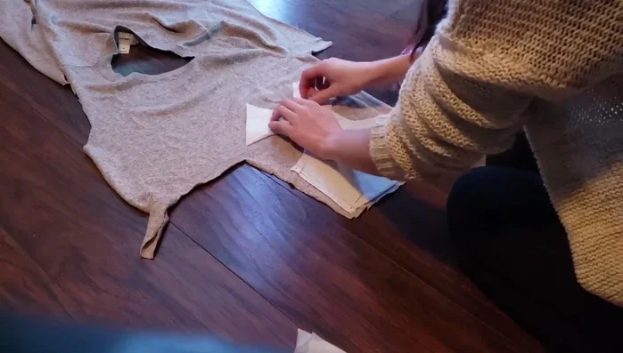 Cut out the sweater fabric pieces.