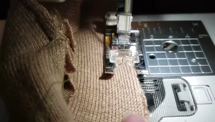 Sew the collar and other edges; use a stay stitch for added security.