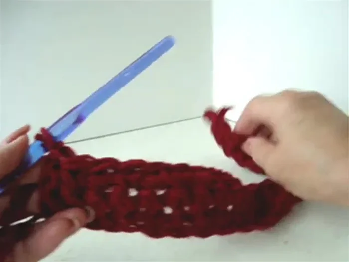 Repeat step 3 for several rows, decreasing each row by skipping the first and second to last stitches. Regularly check the fit on your dog.