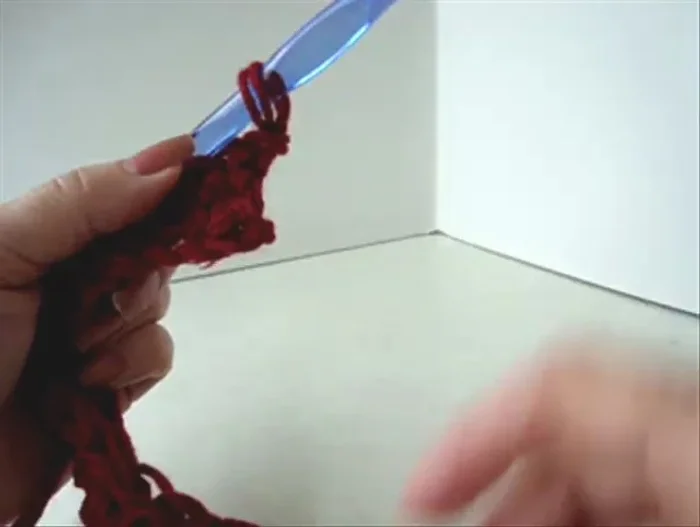 Chain one, turn. Skip the first stitch of the row and the second to last stitch. Single crochet in the remaining stitches.