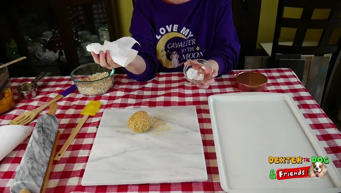 Lightly grease a cookie sheet with coconut oil.