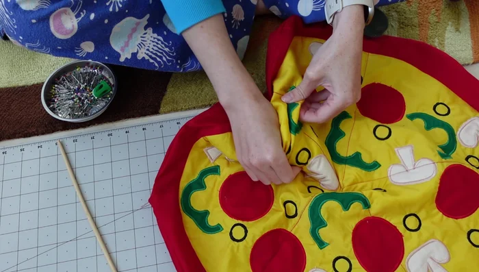 Top stitch each pizza slice.