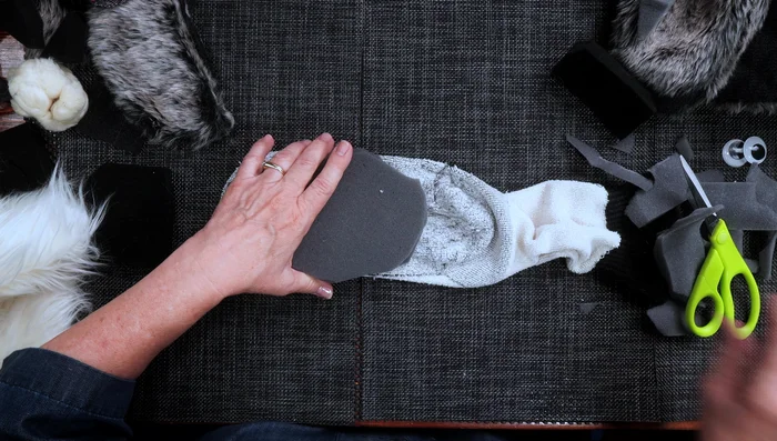 Flip the sock right side out. The foam should create a 3D mouth shape.