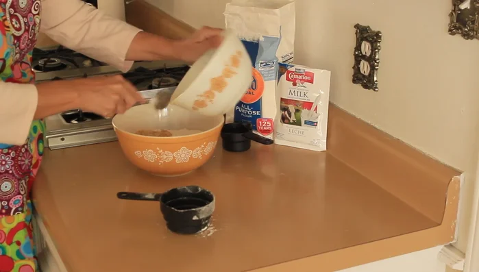 Combine the wet and dry ingredients, adding water as needed to form a dough.