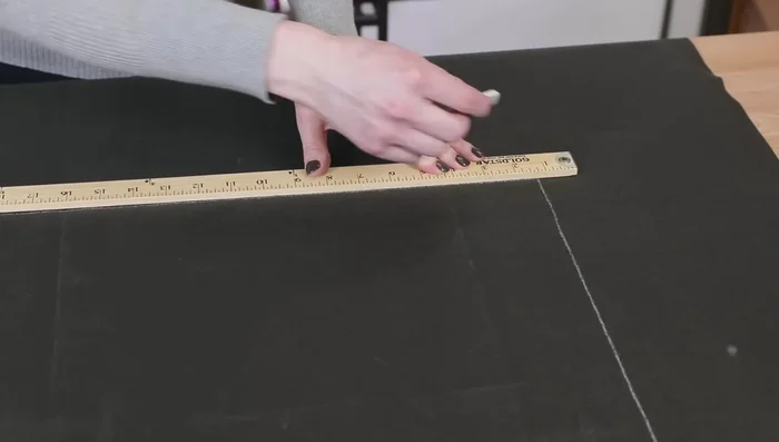 Cut the cushion underlining to be the width of the bed + 1 inch and the length of the bed + 1 1/2 inches.