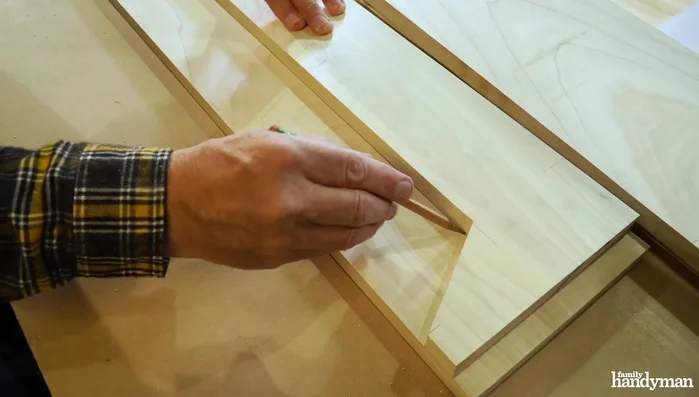 Use the cut front leg as a template to trace the angle onto the other front leg.