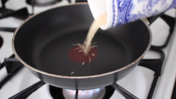 Heat up your pan and add rinsed and dried quinoa. Toast the quinoa until it pops like popcorn, then remove from heat and let it cool.