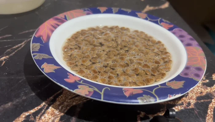 In a separate pan, gently cook eggs in a small amount of water until set. Do not use oil or butter.